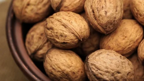Walnut close up on a wooden table Stock Footage 234996374