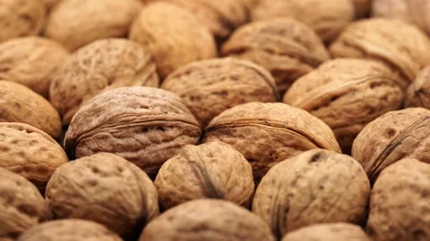Walnut close up on a wooden table Stock Footage 234996376