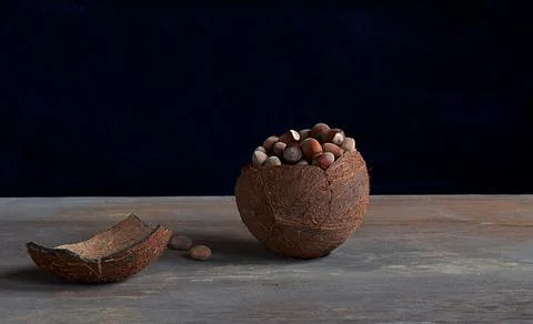 Walnut coconut hazelnuts on an old table. Stock-Fotos