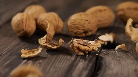 Walnut drops and opens Closeup no. 2 Stock Footage 99165731