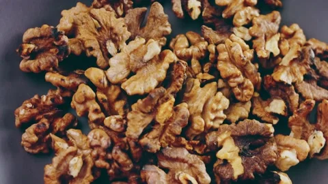 The walnut floats in the air, Candle effect Stock Footage 232851439