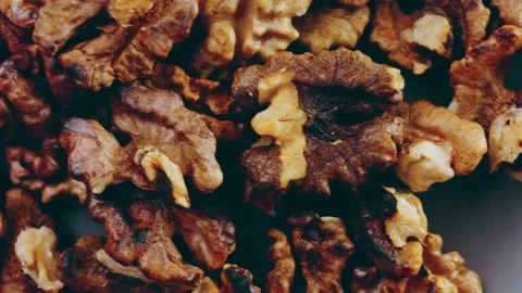 The walnut floats in the air, Candle effect Stock Footage 232851468