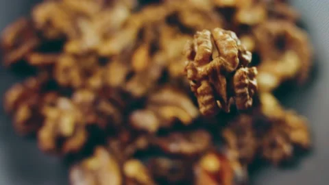 The walnut floats in the air, Candle effect Stock Footage 232851502