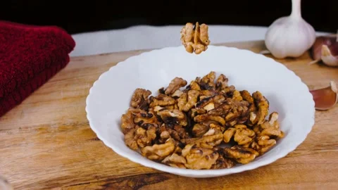 The walnut floats in the air Stock Footage 219937302