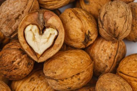 Walnut heart shaped Stock Photos