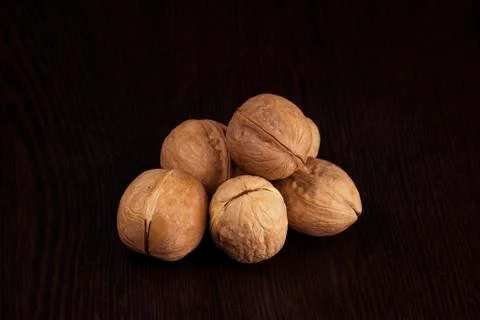 Walnut isolated on a black background. Stock Photos
