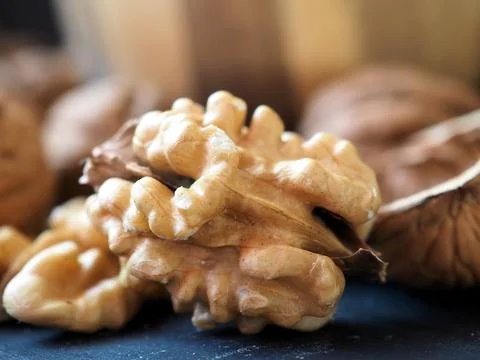 Walnut kernel and empty shell. Close-up 库存照片