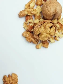 Walnut kernels and shells isolated on white background Stock Photos