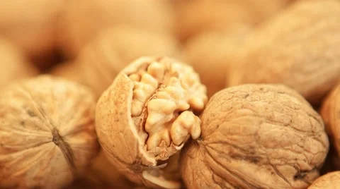 Walnut kernels and whole walnuts at bazaar in Bostanli - Karsiyaka, Izmir. Stock Footage 55807919