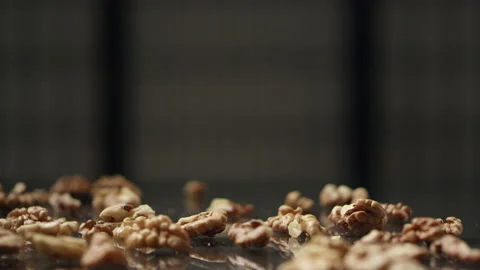 Walnut kernels fall. Slow motion footage. Stock Footage 134949195