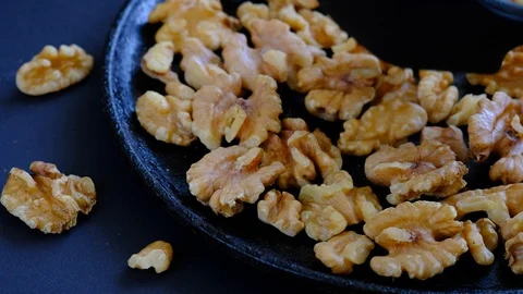 Walnut kernels on the hot pan Video stock 94078546