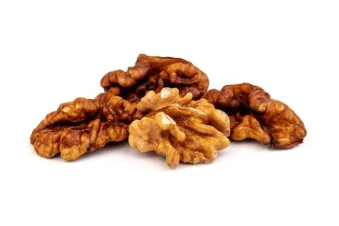 Walnut kernels isolated on white background. Space for text. Stock Photos