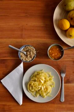 Walnut noodles with jam, plan view Stock Photos