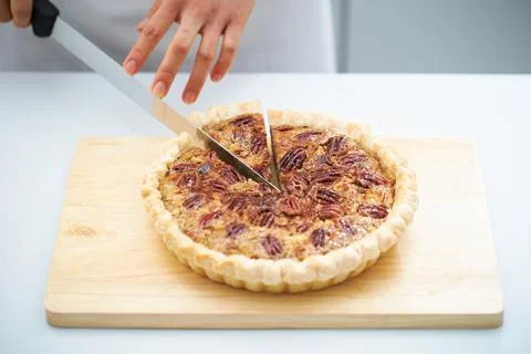 Walnut pie close-up, a piece of walnut pie Stock Photos