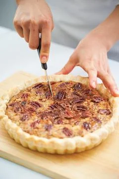 Walnut pie close-up, a piece of walnut pie Stock Photos