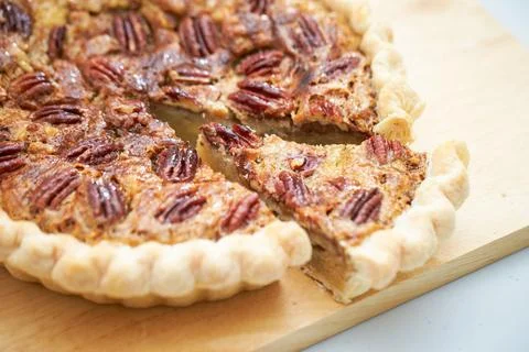 Walnut pie close-up, a piece of walnut pie Stock Photos