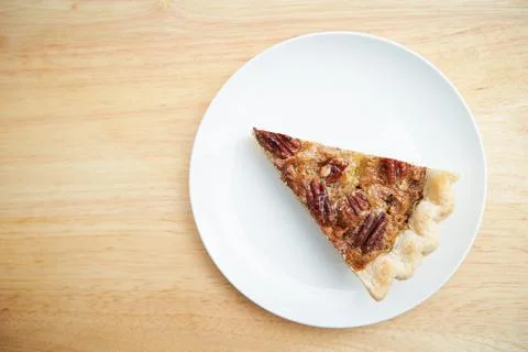 Walnut pie close-up, a piece of walnut pie Stock Photos