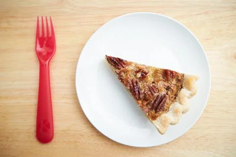 Walnut pie close-up, a piece of walnut pie Stock Photos