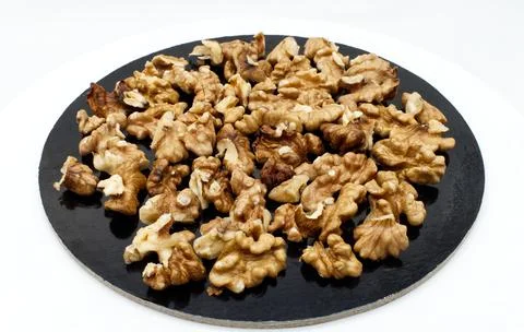 Walnut pile out its shell isolated on white background. Stock-Fotos