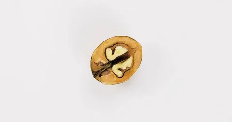 Walnut Rotate. View from above. Three Close Up Macro Shots Stock Footage 128934787