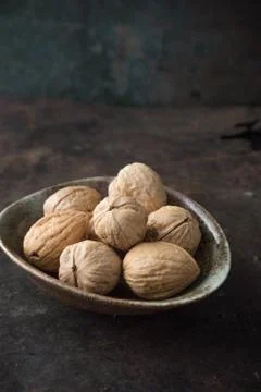 Walnut on rustic background Stock Photos