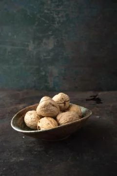 Walnut on rustic background Stock Photos
