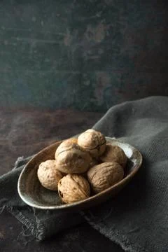 Walnut on rustic background Stock Photos
