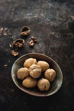 Walnut on rustic background Stock Photos