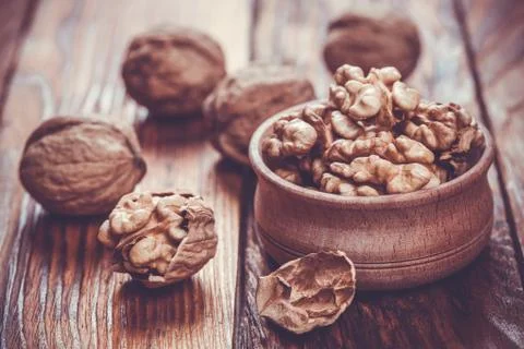 Walnut on rustic old wooden table Stock Photos