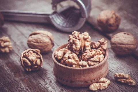 Walnut on rustic old wooden table Stock Photos