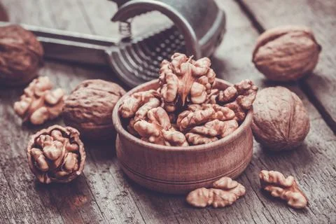 Walnut on rustic old wooden table Stock Photos