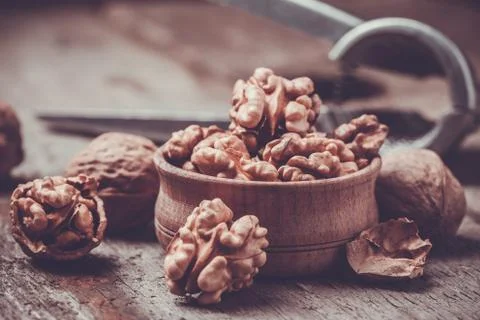 Walnut on rustic old wooden table Stock Photos