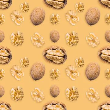 Walnut seamless pattern on brown background. Top view. Banner. Pop art design. Stock Photos