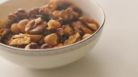Walnut. Walnut on a white plate in kitchen. Food, product rich in minerals and Stock Footage 128587273