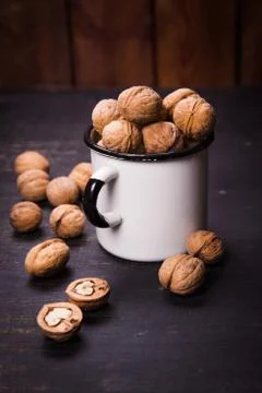 Walnut with white cup Stock Photos