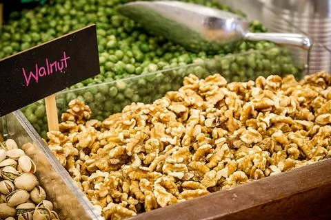 Walnut without shell on the counter. Stock Photos