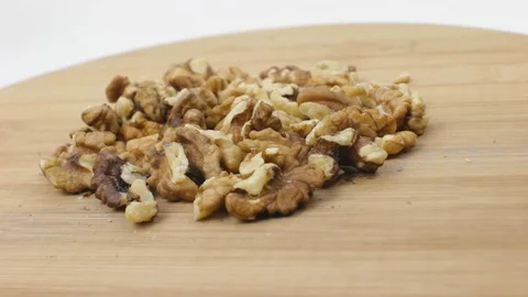 Walnut on a Wooden Plate Stock Footage 88409758