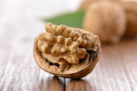 Walnut on a wooden table Stock Photos