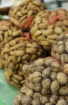 Walnuts and almonds Stock Photos