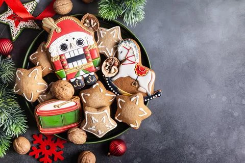 Walnuts and Christmas handmade gingerbread cookies. Stock Photos