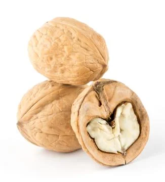 Walnuts and a cracked walnut Stock Photos