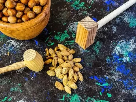 Walnuts and hazelnuts in composition on dark background Foto stock