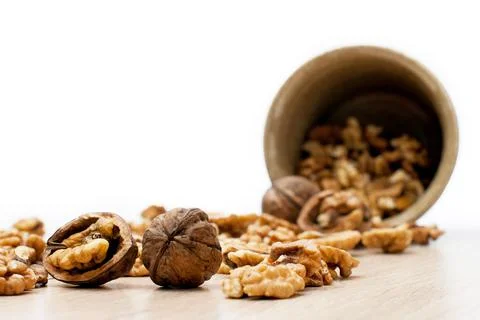 Walnuts and jar in the background Foto stock