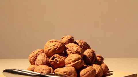 Walnuts and nutcracker front out dolly camera Stock Footage 58887320
