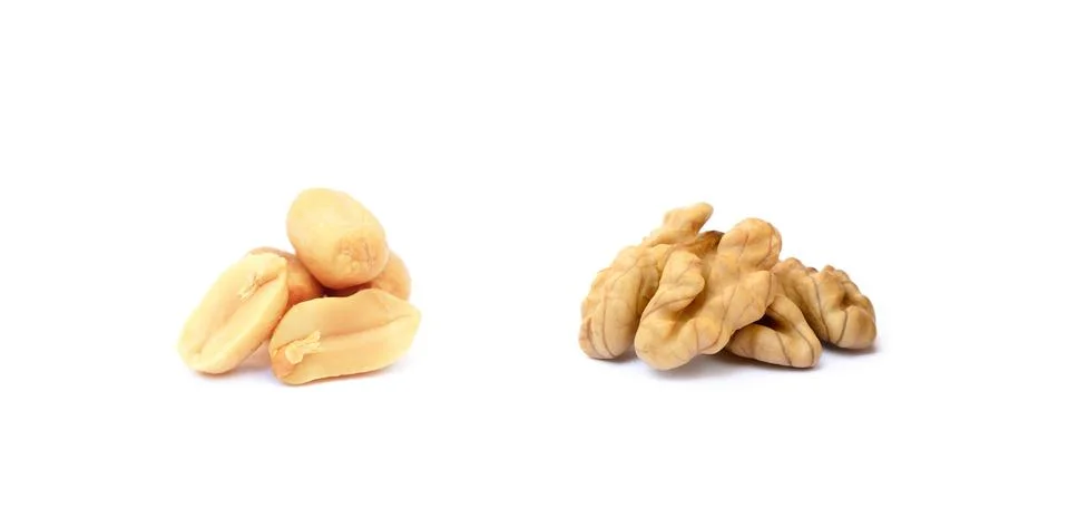 Walnuts and peanuts Stock Photos
