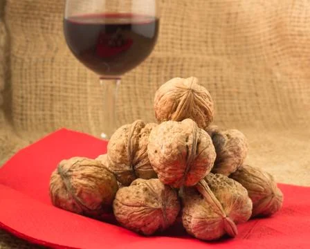 Walnuts and red wine Stock Photos