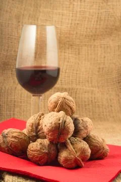 Walnuts and red wine Stock Photos