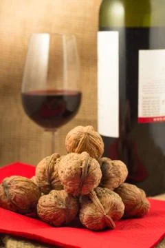 Walnuts and red wine Stock Photos