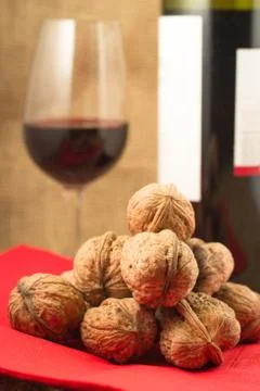 Walnuts and red wine Stock Photos