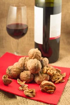 Walnuts and red wine Stock Photos
